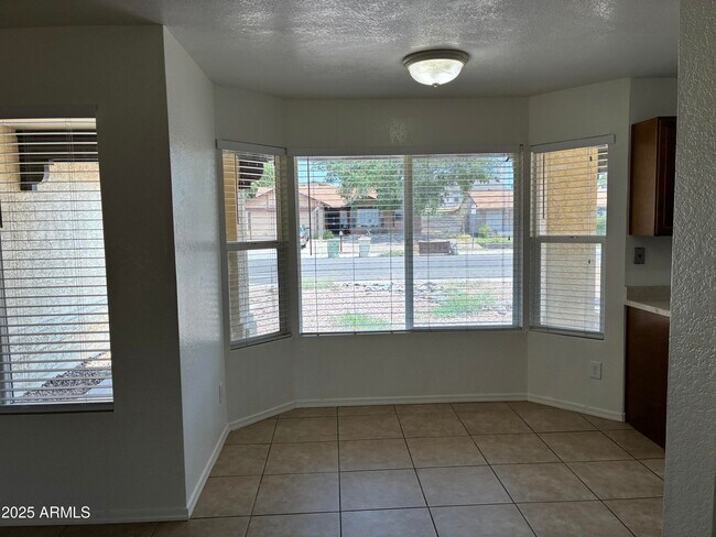 Building Photo - 11014 N 65th Ave