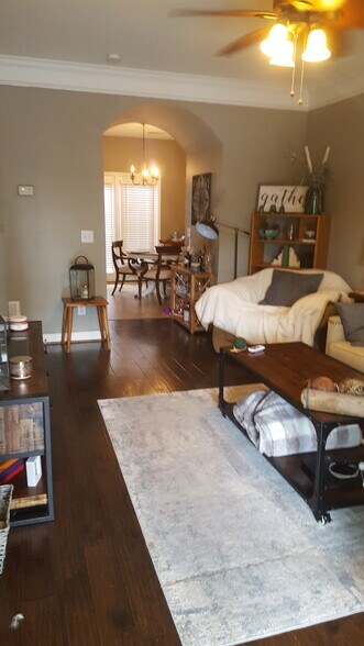 Living Room with half bath/powder room and view to kitchen/dining area. - 2015B Beech Avenue