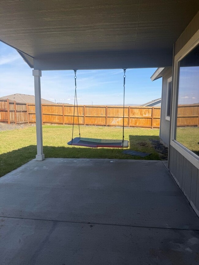 Building Photo - Lots of storage space in this 4- Car garage for all your playthings!!