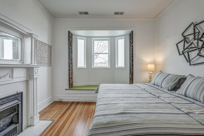 Bedroom #1 with bed & desk - 719 N Meadow St