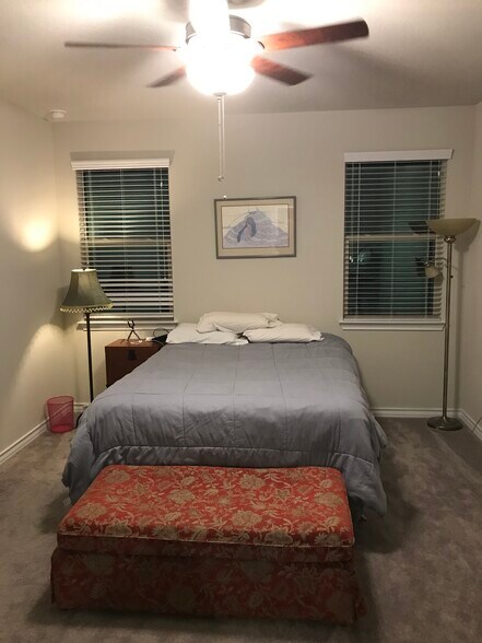Master Bedroom windows are west side facing the greenbelt. You can hear the bullfrogs at night. - 1313 Eagle Ridge Trl