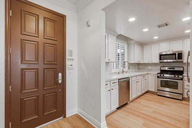 Building Photo - Massive Three Bedroom Two Bath Condo Available now!