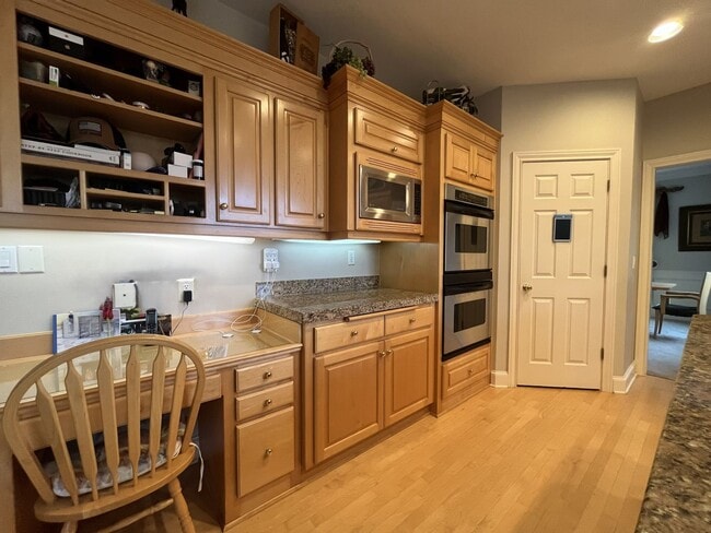 Building Photo - Executive-Style Northwest Heights Home with Forest Views and Refined Architectural Details