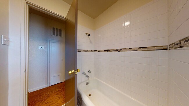Building Photo - UPTOWN 3 Bedroom +Office  2 Bath with Garage