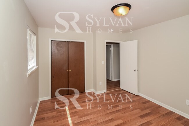 Building Photo - Welcome to this charming abode.
