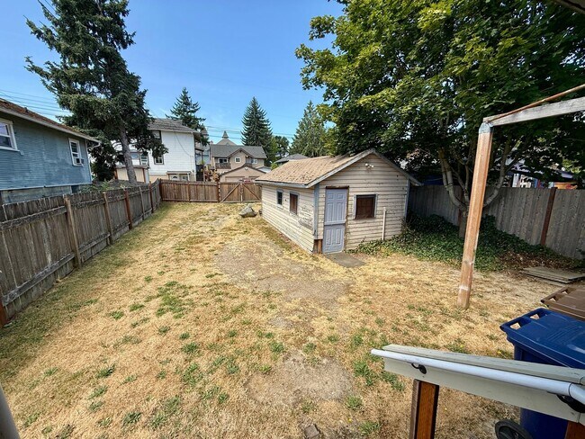 Building Photo - Charming Renovated Cottage with Spacious Y...