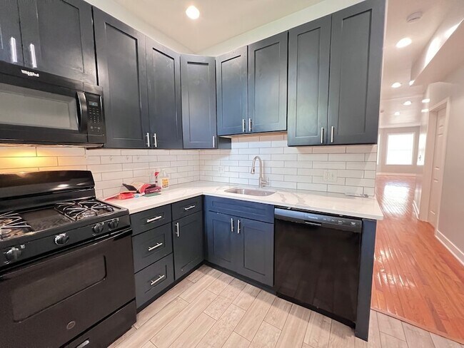 Building Photo - 6402 S Eberhart Ave