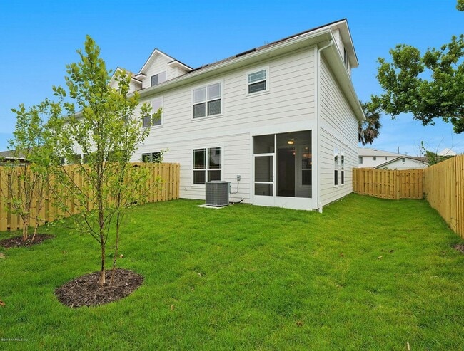 Building Photo - 4 Bedroom 3.5 bath Beauty in Just a Short Stroll to Jax Beach - Garage, Lawncare Included & Fence...