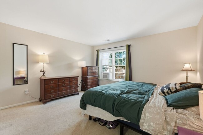 Building Photo - This beautifully refreshed condominium offers a refined blend of style and comfort