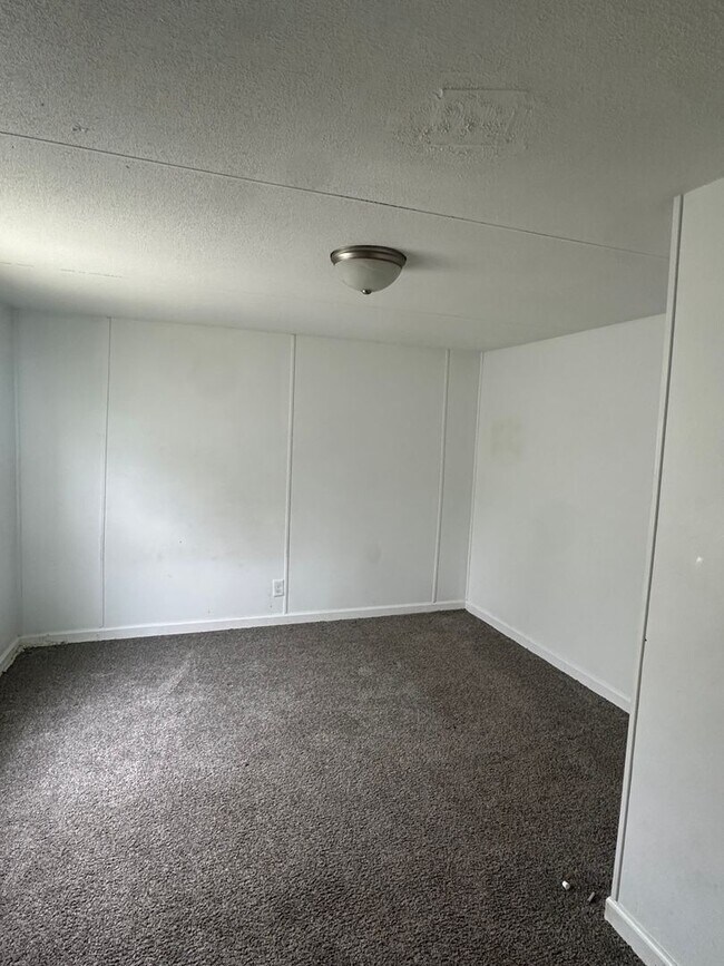 Building Photo - 6245 Speights Chapel Rd