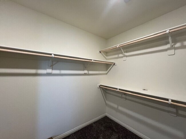 Building Photo - FULLY FURNISHED!!! beautiful 3 bedroom 2 and half bath home is located in the Symmetry Bay Cadenc...