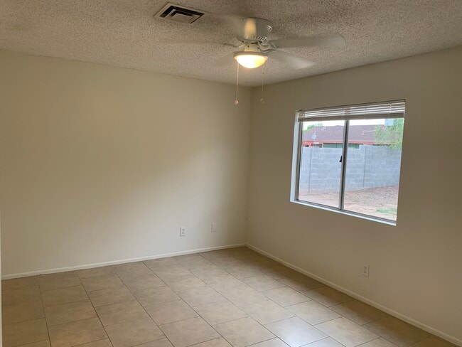 Building Photo - 8620 W Charter Oak Rd