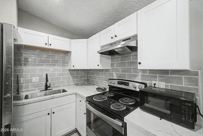 Building Photo - 3646 N 69th Ave