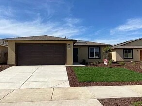Building Photo - FREE RENT FOR MONTH OF JUNE 
"Spacious 4-Bedroom Haven with 2 Full Baths in Merced – Your Dream H...
