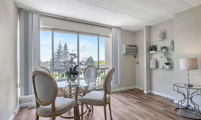 Building Photo - Spacious 1bdrm living room and bedroom with large picture windows bringing in lots of natural light.