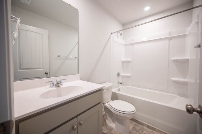 Building Photo - Brand new 4-bedroom / 3 Bath with a main-level guest suite in the sought after Barbour Farms comm...