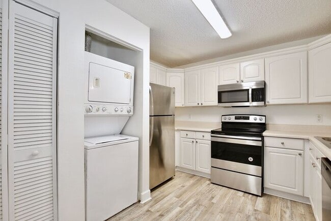 Building Photo - Spacious 3/2 Condo with a Cover Patio Area in the Desirable Palm Villas - Kissimmee!