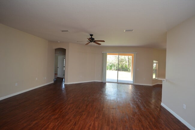 Building Photo - "Spacious 4-Bed Oasis in Palm Coast with 2...