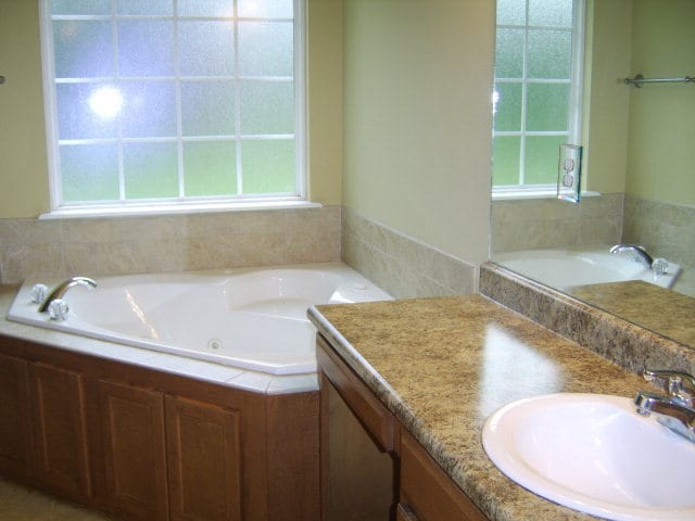 Building Photo - Charming 3BR/2BA Home with Open Floor Plan, Vaulted Ceilings & 2-Car Garage