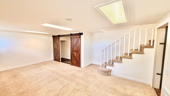 Building Photo - Beautiful Craftsman-style Home with fenced yard space, detached garage and additional parking in ...