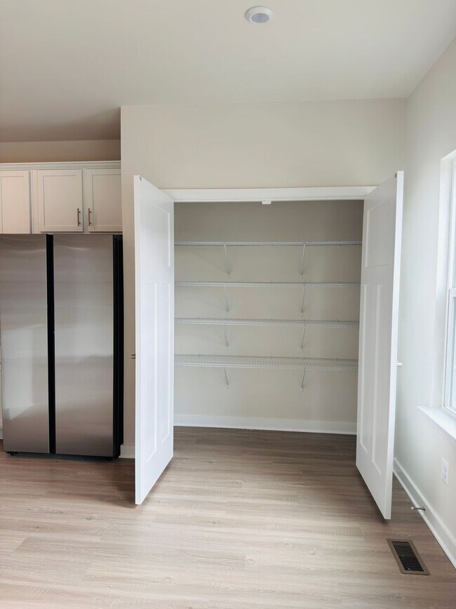 Building Photo - Brand New 4 Bed 3.5 Bath End Unit Townhome in Inwood