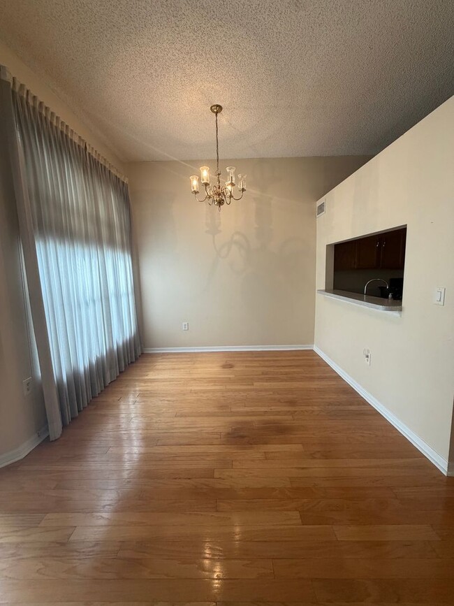 Building Photo - First floor condo in gated East Lake Woodlands of Oldsmar with one car garage