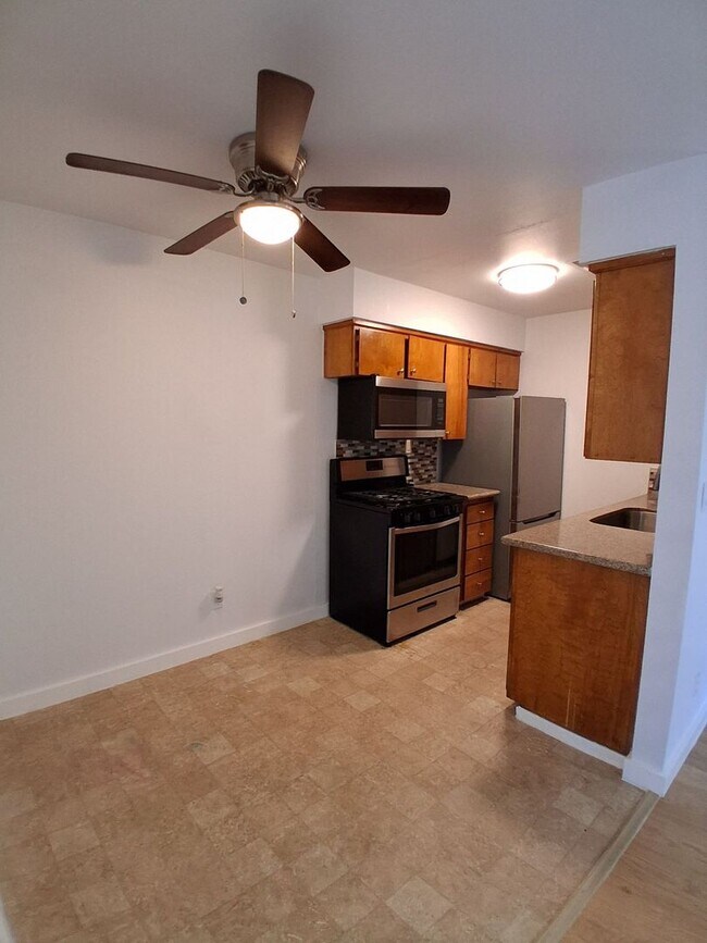 Building Photo - MOVE-IN SPECIAL: HALF OFF THE 1ST MONTH'S RENT – Beautifully Updated 2 Bedroom, 1 Bathroom Condo!