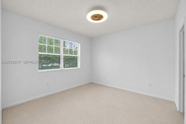 Building Photo - 5880 W Sample Rd