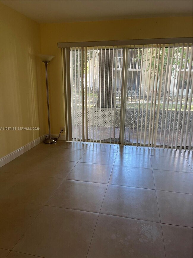 Building Photo - 9408 SW 140th Ct