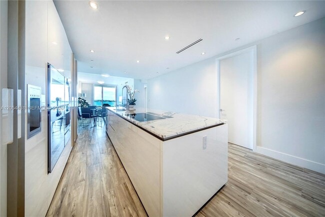 Building Photo - 10203 Collins Ave