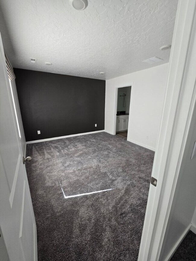 Building Photo - Nearly New, Well Appointed Modern Townhouse w 2 car attached garage