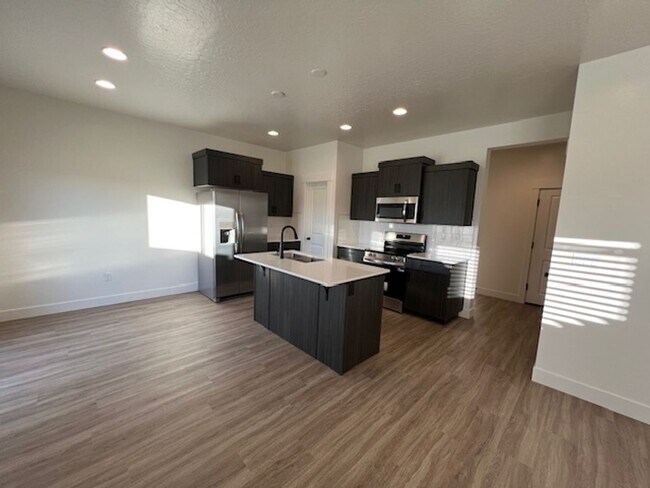Building Photo - BRAND NEW South Desert Townhome with EVSE Outlet
