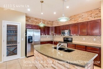 Building Photo - 6113 S 44th Ln