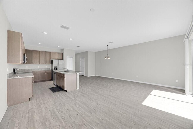 Building Photo - 6321 Tillandsia Pl