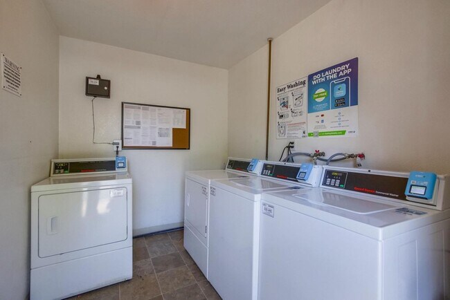 Building Photo - Spanish Garden Style Apartment Community