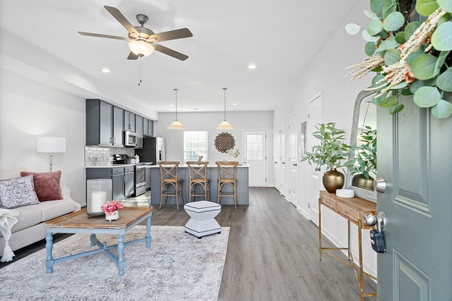 Spacious Living Room with Wood Style Flooring - Victory Place