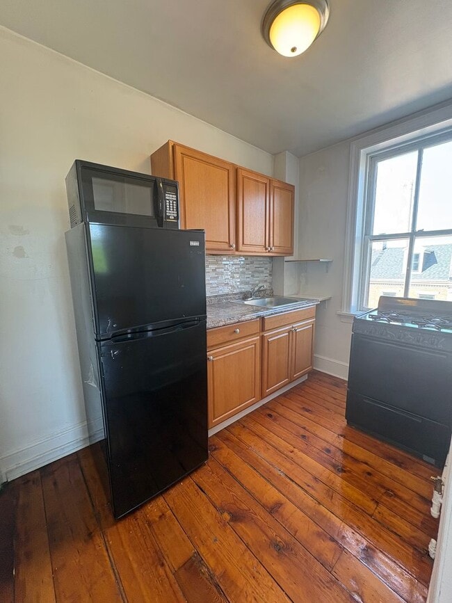 Building Photo - Future Rental! 3rd floor apartment near Central Market and all Downtown Amenities!