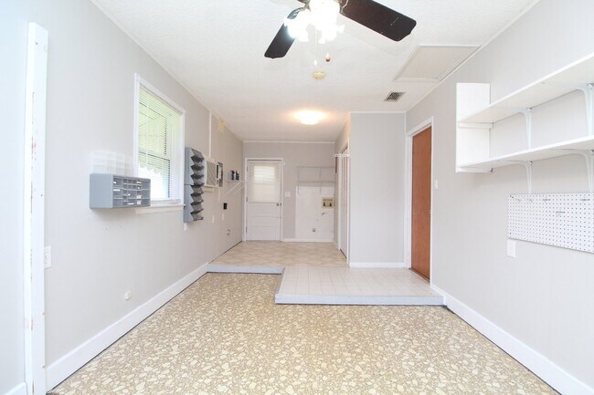Building Photo - Spacious 4BR Home with Bonus Studio, Sunro...