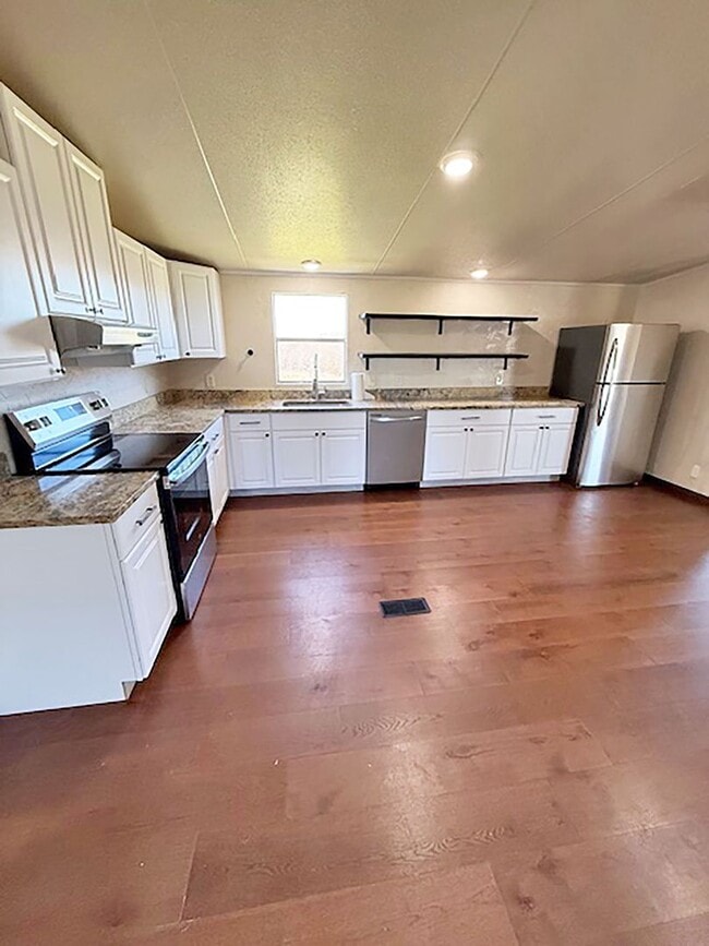 Building Photo - Beautiful 4 Bedroom 2 Bath manufactured home in Rhome Texas on 2 acres.
