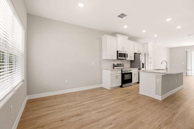 Building Photo - Brand New 4-Bedroom Gem with 2 Full Baths on Large Lot in Lehigh Acres – A Perfect Family Haven!