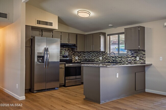 Building Photo - 7660 N Nathan Hale Ave