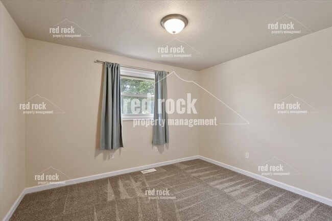 Building Photo - 2211 E 49th Ave
