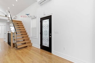 Building Photo - 21-28-28 48th St