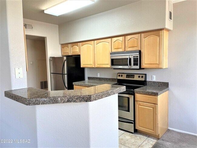 Building Photo - 7050 E Sunrise Dr