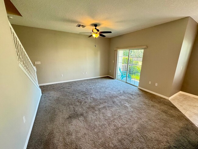 Building Photo - Move in ready 3/2 New Construction Townhou...