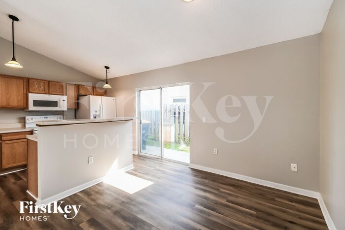 Building Photo - 6565 Gentle Oaks Dr