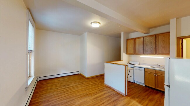 Living Room - The Badger Den Apartments on Gilman