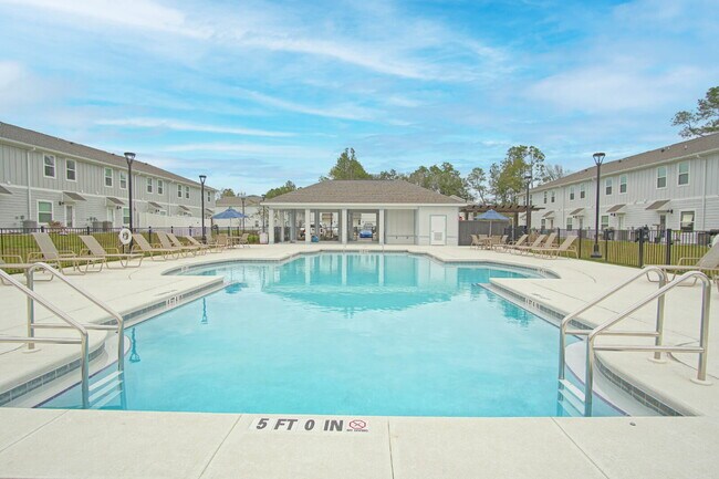 Building Photo - Don’t Miss This 3BR Townhome in North Pensacola — Garage, Modern Finishes, Community Pool & Easy ...