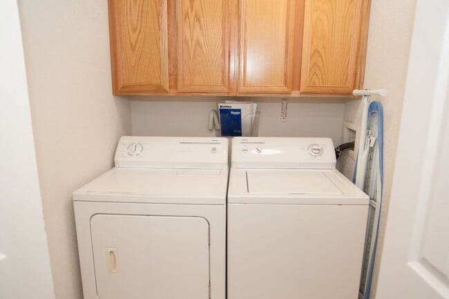 Building Photo - Updated and Bright 2B/2B with Attached Garage Now Available!