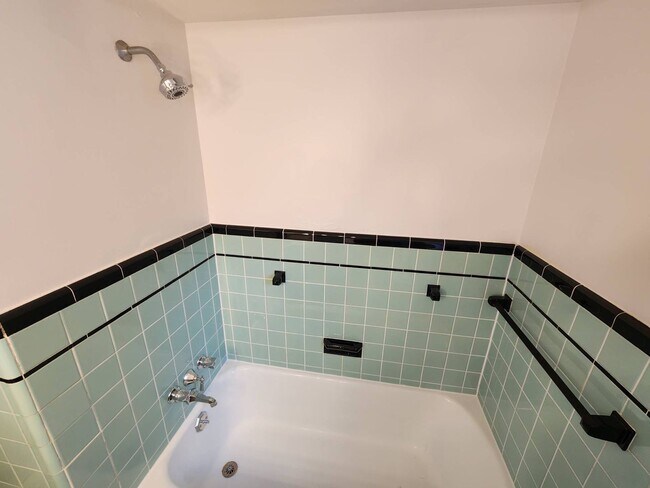 Building Photo - Move-In Special: Save $300 on This Charmin...